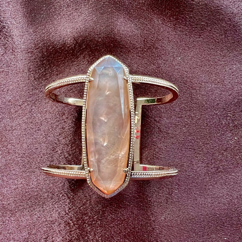 Rose gold cuff bracelet with rose gold quartz stone.